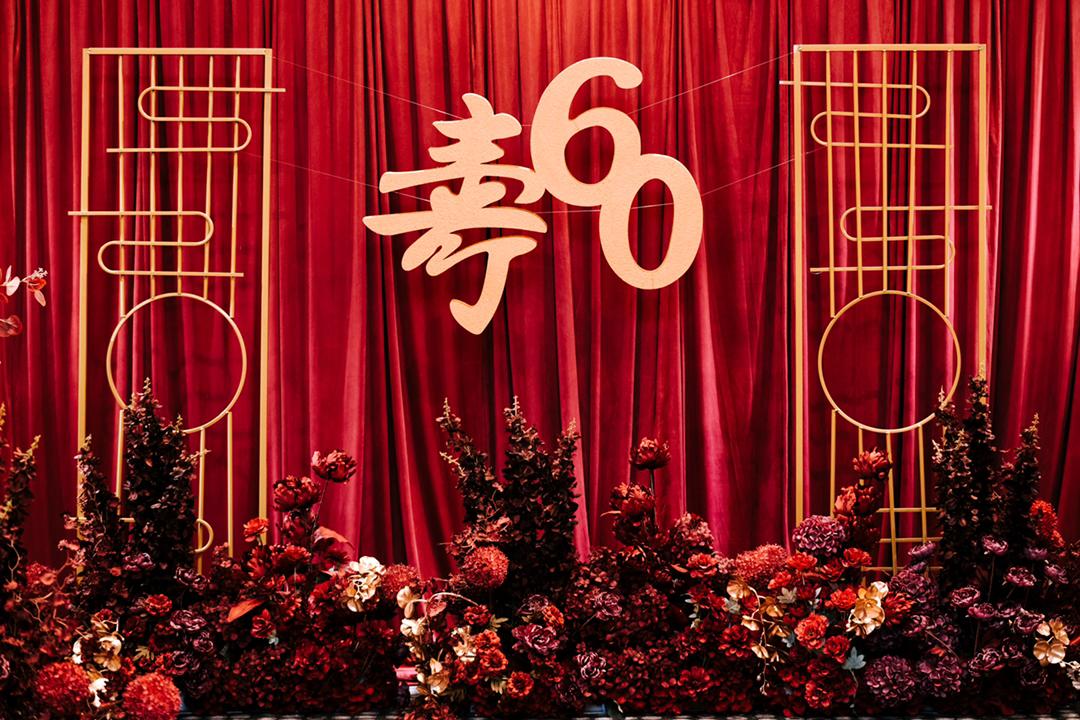 60th birthday celebration setup with floral decorations