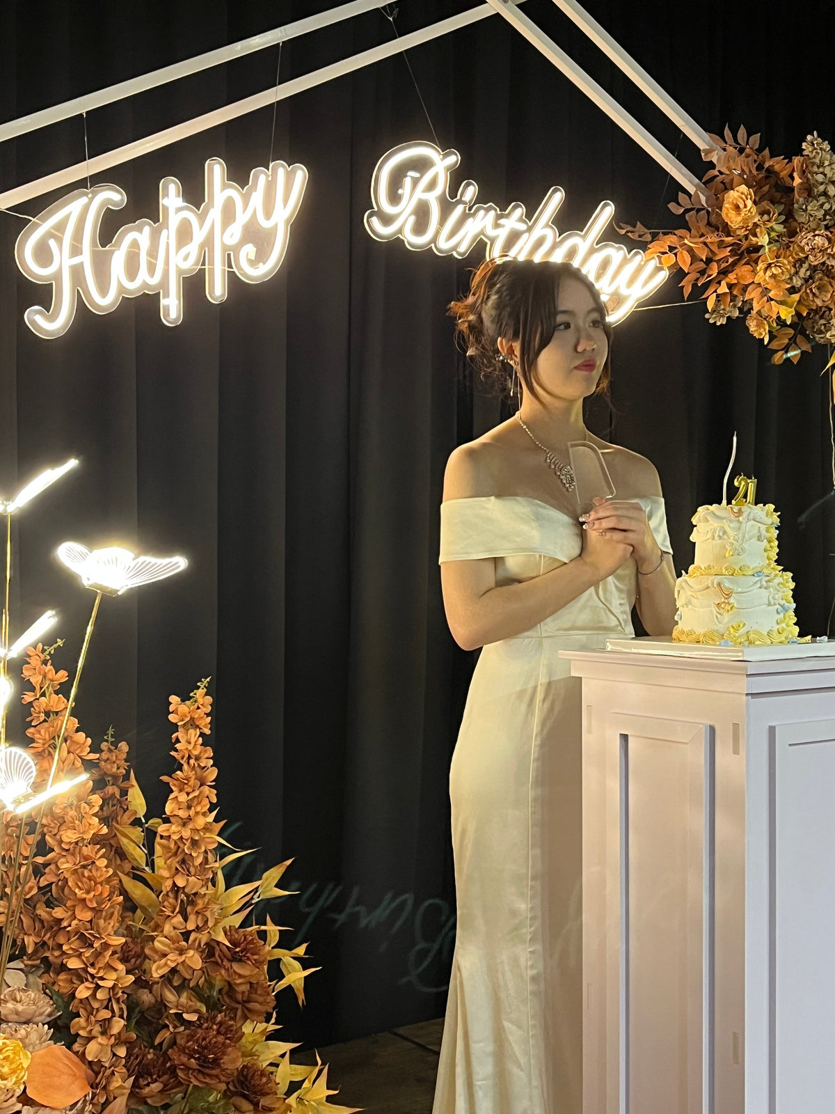 Elegant birthday celebration setup with floral decorations